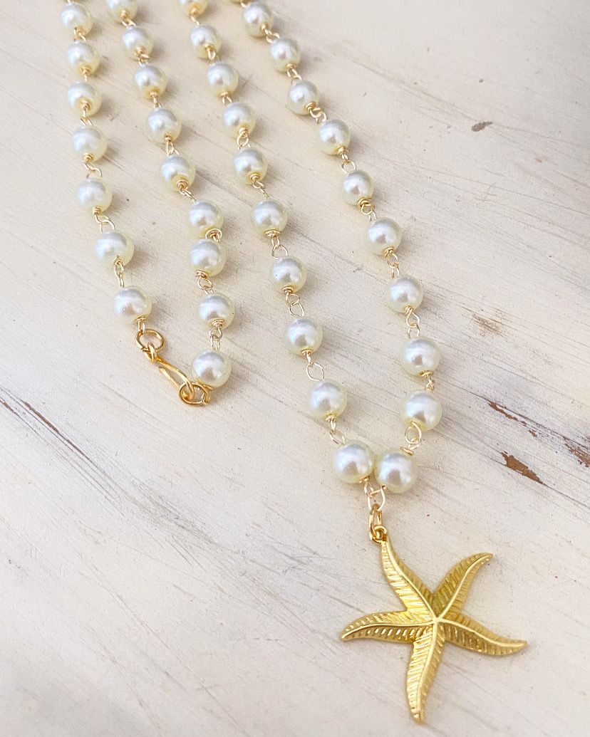 ESTRELLA DE MAR CON PERLAS