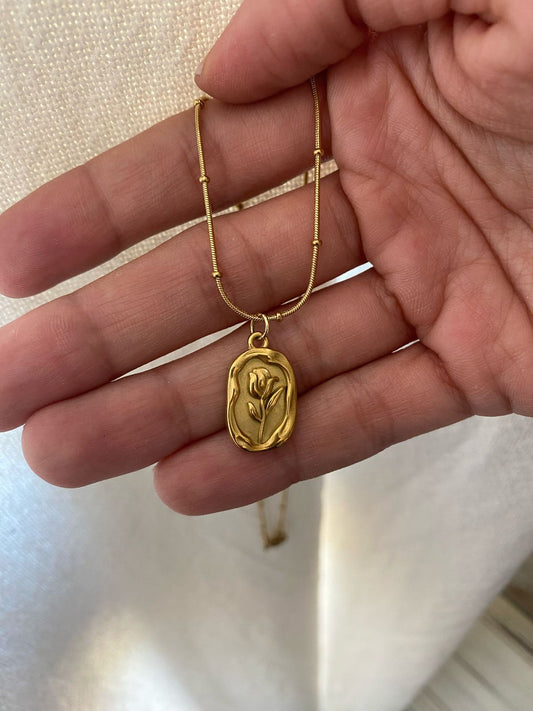 MEDALLA FLOR ACERO